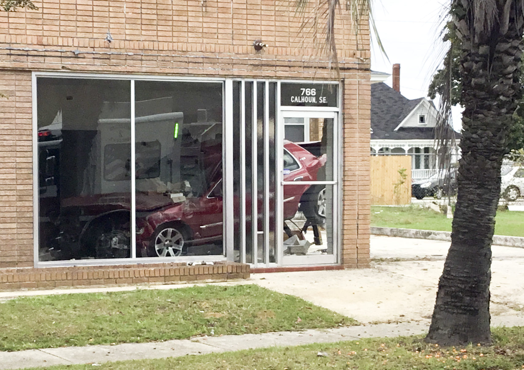 Car Crashes into Building